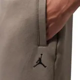 Pantalon de jogging Nike Jordan modelo Brooklyn Fleece, color marron topo, con cintura elastizada, cordones ajustables, bolsillos laterales y logo Jumpman bordado en negro.