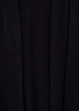 Cardigan de punto fino color negro, con diseño abierto sin cierre, cuello en V y mangas largas.