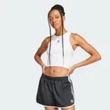 Musculosa blanca de corte ajustado con logo Adidas en el pecho.