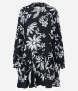 Vestido corto de viscosa con estampado floral en blanco y negro, escote en V, mangas largas con lazo en los puños y volados en el ruedo.