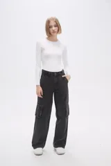 Body manga larga de poliamida, color negro, liso, ajustado al cuerpo y con cuello a la base.