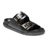 Sandalia Birkenstock modelo St Barths de cuero negro, con dos correas ajustables con hebillas metálicas doradas y plantilla anatómica.