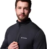 Campera de polar con cierre frontal completo, cuello alto y diseño de textura de rejilla. Cuenta con un bolsillo vertical en el pecho con cierre y bolsillos laterales. Incluye tecnología Omni-Wick para control de humedad.