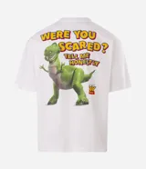 Remera blanca de algodón con cuello redondo y manga corta, con estampa localizada en la espalda del personaje Rex de Toy Story y la frase Were you scared? Tell me honestly.