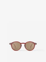 Lentes de sol Izipizi Junior color rojo con lentes marrones redondas.