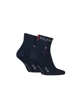 Medias tobilleras azul marino Tommy Hilfiger, con logo bordado en el puño y pequeños detalles tricolores característicos de la marca.