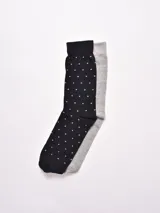 Pack de dos pares de medias de hombre, uno negro con pequeños lunares blancos y otro gris liso.