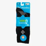 Medias de trekking Columbia de lana merino, color negro con detalles en gris. Diseño de peso medio con tecnología Omni-Wick para absorción de humedad, soporte de arco, ventilación de malla y tratamiento Polygiene para control de olores.