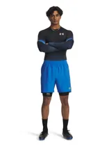 Remera de compresión de manga larga Under Armour, diseñada con tecnología HeatGear para absorción de sudor y secado rápido. Presenta un diseño ajustado al cuerpo en color negro con detalles en azul degradado en las mangas y el logo de la marca en el pecho.