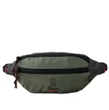 Riñonera Rip Curl modelo Search Packable, fabricada en color verde militar con detalles en tela cuadriculada negra y tiradores de cordón con detalles rojos. Cuenta con compartimento principal con cierre, bolsillo frontal con cierre y el logotipo de la marca estampado en la parte inferior.
