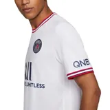 Camiseta de fútbol Nike del Paris Saint-Germain, modelo Stadium Home. Diseño blanco con detalles en azul marino y rojo en cuello y mangas. Incluye logo de Nike, escudo del club y sponsor ALL en el frente.