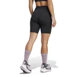 Calza corta deportiva Adidas Terrex de tiro alto, color negro, con bolsillos laterales y logo estampado en la pierna.