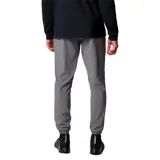 Pantalón jogger Columbia Hike Jogger Omni-Shield de color gris, con cintura elástica y cordón ajustable, bolsillos delanteros, dobladillos elásticos y bolsillo trasero con cierre. Incorpora tecnología Omni-SHIELD resistente al agua y a las manchas, y detalles reflectantes.