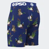 Calzoncillos bóxer de hombre PSD con estampado de patos y vegetación acuática sobre fondo azul. Cintura elástica azul con logo de la marca en blanco.