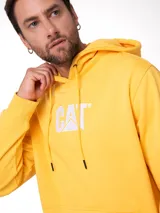 Buzo con capucha de algodón color amarillo, con bolsillo tipo canguro frontal y logo de la marca bordado en el pecho. Presenta puños y bajo de punto acanalado.