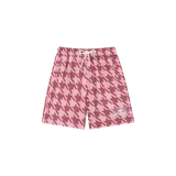 Short de baño Eme Studios con estampado houndstooth en tonos bordó y rosado, cintura elástica con cordón de ajuste blanco y etiqueta con el logo de la marca en el lateral.