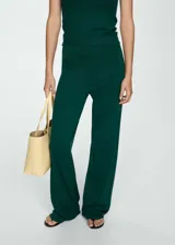 Pantalon wideleg de tejido de punto fino, con cintura elástica y diseño largo de corte fluido.