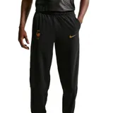 Pantalón deportivo Nike de la selección francesa de fútbol, color negro con detalles en dorado. Presenta el escudo de la FFF y el logo de Nike en el muslo, con cintura elástica y puños ajustados en los tobillos.