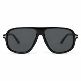 Lentes de sol Tyla de estilo aviador con armazón negro de policarbonato y detalles metálicos dorados en las bisagras. Cuentan con lentes oscuras con protección UV400.