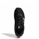 Championes Adidas Cloudfoam Flex, modelo deportivo para mujer, color negro con las clásicas tres tiras en blanco y suela amortiguada de goma blanca.