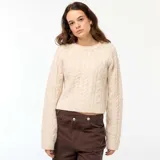 Sweater de punto con diseño trenzado, cuello redondo y mangas largas, de calce holgado y acabado texturizado.