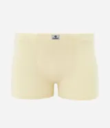 Calzoncillo bóxer color crema de algodón, sin estampa y con elástico en la cintura con el logo de la marca.