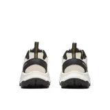 Championes de trekking Merrell modelo Speed Strike 2 Trek, con diseño técnico en colores beige, negro y detalles en amarillo. Presentan una combinación de malla transpirable, ante y materiales sintéticos, con entresuela de espuma EVA y suela de goma de alta adherencia.