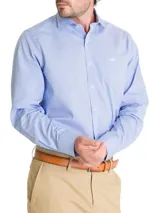 Camisa de manga larga RKF confeccionada en popelina de algodón, con diseño de cuadros finos en tono azul. Presenta cuello italiano, cierre frontal con botones y bolsillo en el pecho con el logo de la marca bordado.