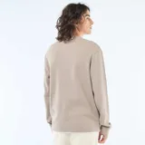 Sweater de tejido nido de abeja color beige, con cuello redondo, mangas largas y puños elastizados acanalados.