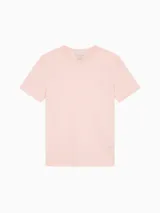 Remera de cuello redondo y manga corta, confeccionada en tejido de punto de algodón regenerativo. Presenta un diseño de corte regular con el logo de la marca bordado en el mismo tono en el pecho.
