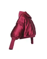 Campera estilo bomber crop color negro, capitoneada con capucha y guantes.