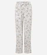 Pantalón de pijama de corte recto, color beige con estampado integral de osos. Presenta cintura elástica con lazo ajustable.