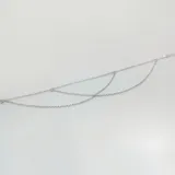 Tobillera de plata 925 con diseño de triple cadena tipo rolo, que se entrelazan creando un efecto de capas.