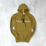 Canguro mostaza de algodón sin felpa, con capucha y cordones negros. Estampa frontal con el logo de la marca Duxon Jeans en blanco y negro.