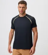 Remera deportiva Get Over de poliéster y elastano, color negro, con tecnología dry, cuello redondo y mangas cortas de corte raglán con detalles de líneas en contraste.
