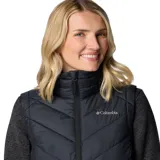 Chaleco Columbia Heavenly II de color negro, con diseño acolchado y tecnología termorreflectante Omni-Heat. Cuenta con cierre frontal de dos vías, cuello alto forrado y bolsillos laterales con cierre.