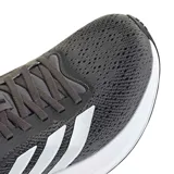 Championes de running Adidas Response Pace W para mujer, de color gris oscuro con las tres tiras características en tono plateado y entresuela blanca.