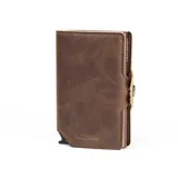 Billetera tipo tarjetero de cuero negro con caja de aluminio interna y sistema de deslizamiento para tarjetas. Cuenta con cierre mediante broche a presión.