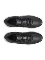 Championes de golf Under Armour modelo Drive Medal SL, color negro con detalles en gris y suela blanca. Fabricados con parte superior de microfibra duradera y mediasuela Charged Cushioning para mayor amortiguación y respuesta. Suela exterior sin tacos diseñada para ofrecer tracción y flexibilidad en el campo.