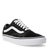 Championes Vans modelo Old Skool, de diseño clásico urbano en color negro con la icónica franja lateral blanca. Confeccionados en una combinación de lona y gamuza, cuentan con punteras reforzadas, cuello acolchado y suela de goma con diseño waffle.