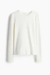 Remera de manga larga y cuello redondo, entallada, de punto de algodón.