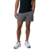 Short deportivo gris Columbia modelo Stealth Spring Lined, confeccionado con tecnología Omni-Wick para control de humedad, con cintura elástica y bolsillos laterales.