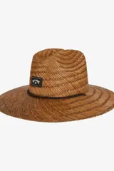 Sombrero de paja Billabong Tides color marrón, con cordón negro en la base de la copa y parche con logo de la marca.