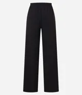 Pantalón flare negro con textura acanalada, cintura elástica con lazo y confeccionado con viscosa certificada.