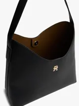 Cartera de hombro Tommy Hilfiger con silueta semiestructurada y acabado granulado. Presenta un diseño minimalista con el monograma TH metálico en el frente, asa superior fija y cierre de botón a presión. Incluye un monedero extraíble a contraste en el lateral.