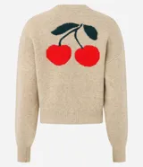 Cardigan de punto color beige con cierre frontal, cuello redondo, mangas largas y detalle bordado de cerezas en el pecho. Presenta puños y ruedo acanalados.