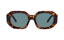 Lentes de sol con armazón de acetato en estampado carey y cristales oscuros en tono verdoso. Presentan un diseño de forma geométrica redondeada.
