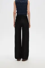 Pantalon de jean recto de tiro alto con acabado brillante tipo glitter.