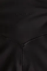 Leggings deportivos negros de tiro alto, confeccionados en tejido funcional SoftMove™ con tecnología DryMove™ para absorción del sudor. Presentan cintura ancha con un delicado diseño cruzado o fruncido en la parte frontal y ajuste ceñido al cuerpo.