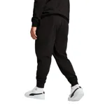 Pantalón de jogging Puma Essentials, color negro, con cintura elástica, puños acanalados y logo de la marca estampado en el muslo izquierdo.